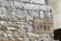 115